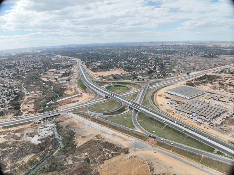 Aerial view of the Mbudzi Interchange near Harare, a multi level freeway interchange engineered by DNMZ International.